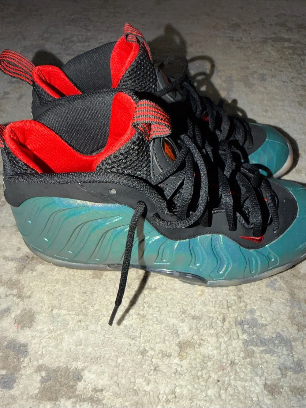 Nike Kids Sneakers Black with Iridescent Teal and Red Accents